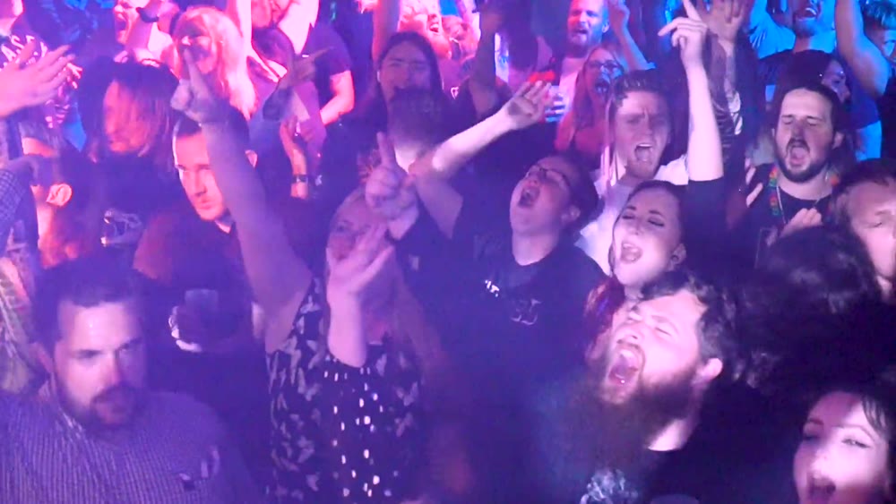 Crowd screaming every word at a Panic At The Emo night
