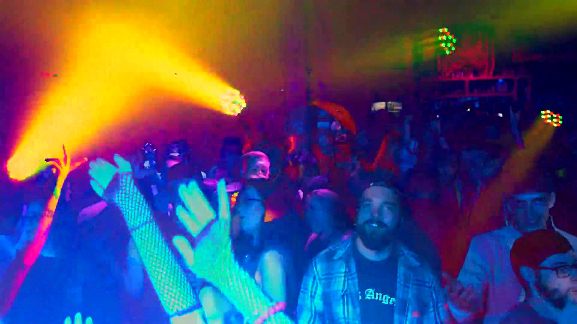The crowd under the lights, colour everywhere